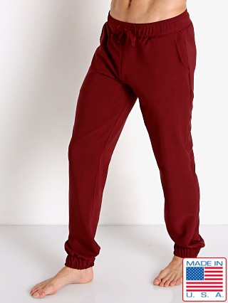 Model in merlot LASC Stretch Tech Travel Pants