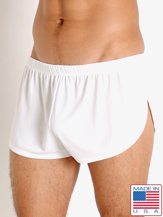 Model in white LASC Matte Jersey Fly Away Shorts