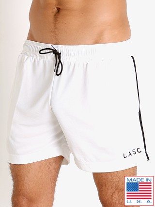 Model in white LASC Matte Jersey Gym Shorts