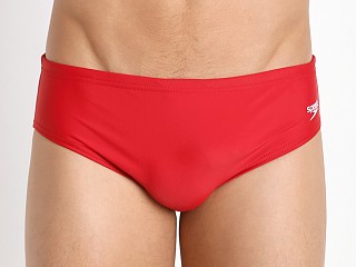 Model in true red Speedo Powerflex Eco Solid Brief