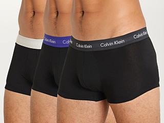 Model in black multi Calvin Klein Cotton Stretch Low Rise Trunk 3-Pack