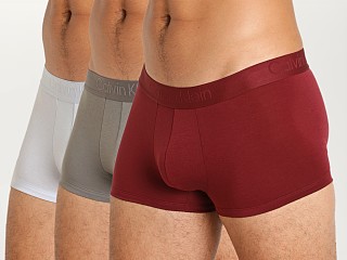 Model in tawny port/arctic ice/charcoal gray Calvin Klein CK Black Low Rise Trunk 3-Pack