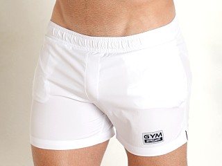 Model in white Ergowear GYM & Swim Short with Built-In Feel Bikini