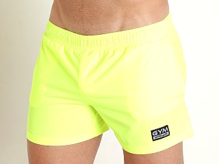 Model in neon yellow Ergowear GYM & Swim Short with Built-In X4D Thong