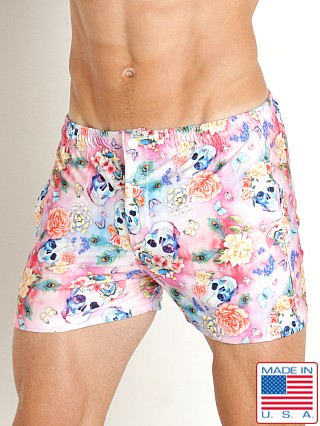 Model in floral skulls LASC Malibu Swim Shorts