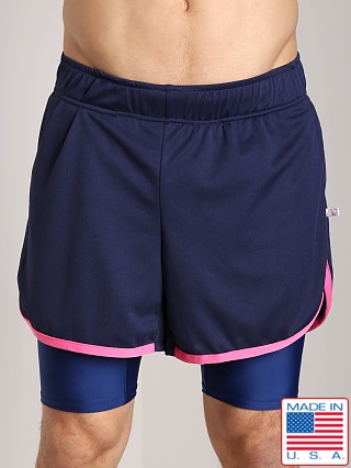 Model in navy/neon pink American Jock Competition Workout Short