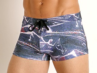 Model in faux vinyl 2xist Fashion Sliq Cabo Swim Trunk