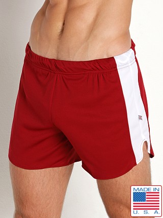 Model in burgundy American Jock Decathlon Relay Short with Built-in Jock