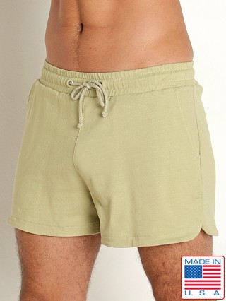 Model in sage leaf Go Softwear Zion OverDye Pocket Short