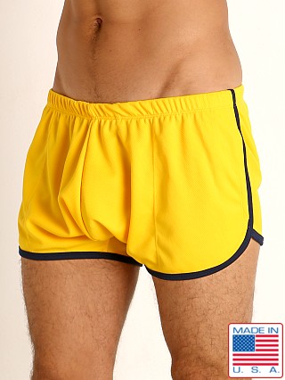 Model in gold/navy Rick Majors Pique Mesh Bulge Shorts