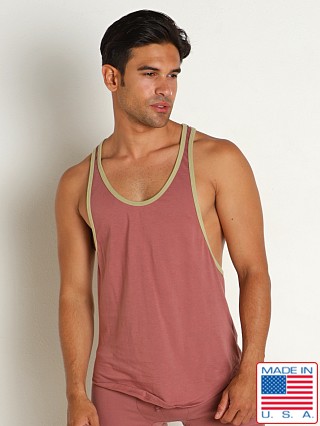 Model in red clay Go Softwear Zion OverDye Athletic Tank Top