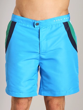 Model in bright blue Hugo Boss Rainbowfish Swim Shorts