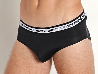 Model in black Diesel 55-D Brief