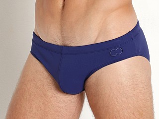 Model in navy 2EROS V10 Core Swim Briefs