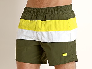 Model in olive/lime Hugo Boss Filefish Swim Shorts