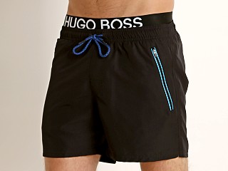 Model in black Hugo Boss Thornfish Swim Shorts