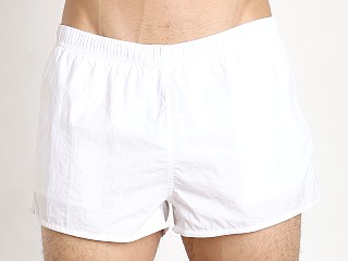 Model in white Emporio Armani EA7 Big Logo Swim Shorts