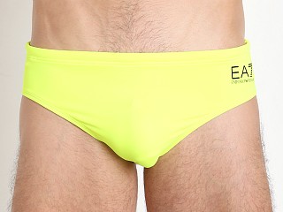 Model in acid lime Emporio Armani Active Swim Brief