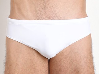 Model in white Emporio Armani EA7 Eagle Swim Brief