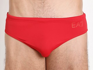 Model in red Emporio Armani Luxury Swim Brief