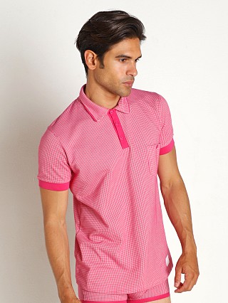 Model in fuchsia Modus Vivendi Country Polo Shirt