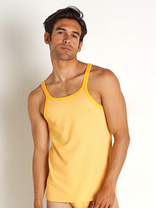 Model in yellow Modus Vivendi Country Tank Top