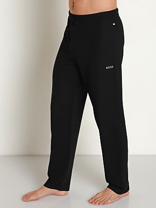 Model in black Hugo Boss Waffle Pants