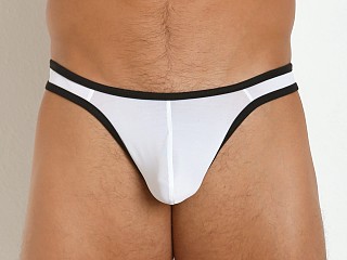 Model in white/black Tulio Sling C-Enhancer Slinky Thong