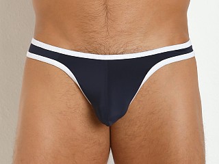 Model in navy/white Tulio Sling C-Enhancer Slinky Thong