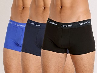 Model in black/blue shadow/cobalt water Calvin Klein Cotton Stretch Wicking Low Rise Trunk 3-Pack Multi