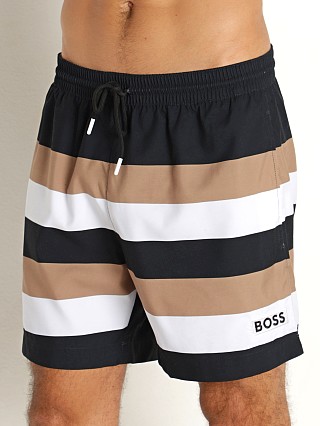 Model in brown Hugo Boss Palu Swim Shorts