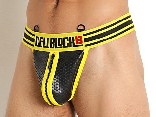 Model in yellow Cell Block 13 Gauntlet Zipper Thong