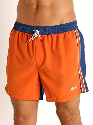 Model in orange Hugo Boss Bluefin Swim Shorts