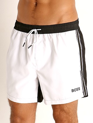 Model in white Hugo Boss Bluefin Swim Shorts