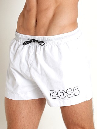 Model in white Hugo Boss Mooneye Swim Shorts