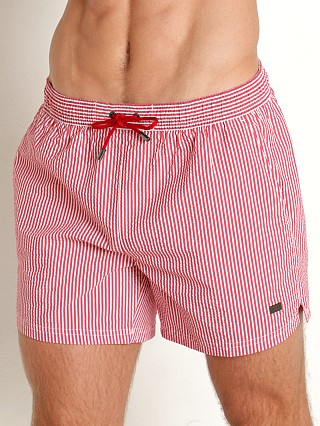 Model in pink Hugo Boss Velvetfish Swim Shorts