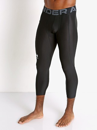 Model in black Under Armour Heatgear 3/4 Compression Legging