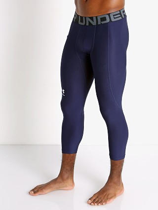 Model in midnight navy Under Armour Heatgear 3/4 Compression Legging