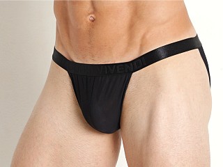 Model in black Modus Vivendi Muslin/Mesh Tanga Brief