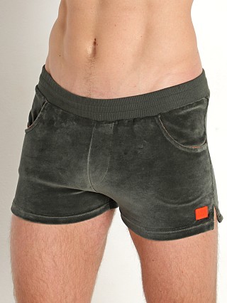 Model in khaki Modus Vivendi Velvet Shorts