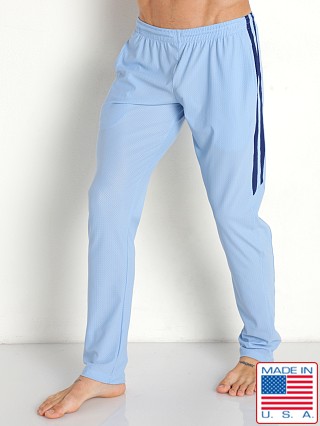 Model in sky blue LASC Performance Mesh Pant