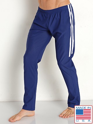 Model in navy LASC Performance Mesh Pant