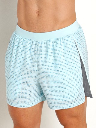 Model in fuse teal/reflective Under Armour Launch 5" Printed Running Short Fuse Teal/Reflectiv