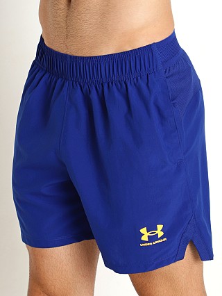 Model in bauhaus blue/orange shock Under Armour Accelerate Shorts