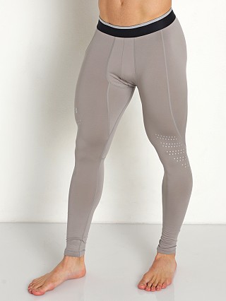 Model in pewter/reflective Under Armour ColdGear Leggings