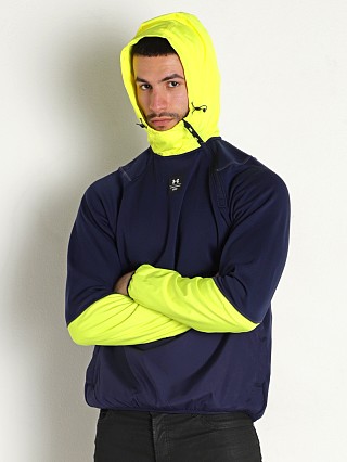 Model in midnight navy/yellow ray Under Armour Rush Fleece Hoodie