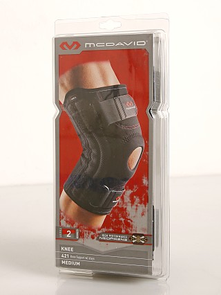 Model in black McDavid Sports Medicine Knee Support w/ Stays