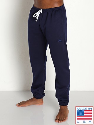 Model in navy LASC Heavy-Duty Fleece Gym Pants