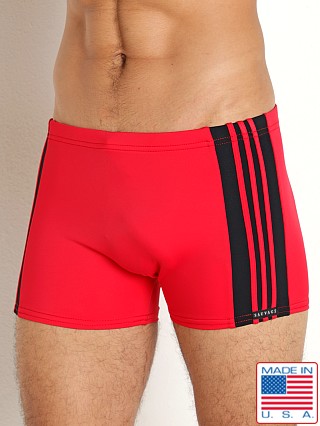 Model in red/black Sauvage Freestyle Nylon Lycra Swim Trunk