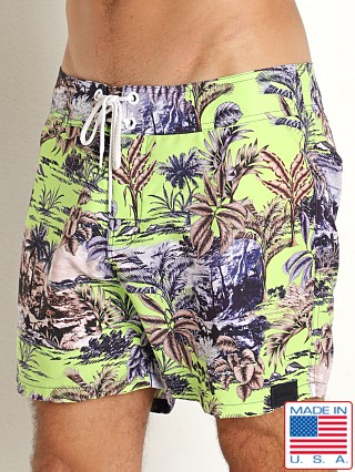 Model in jungle palms Sauvage Boardwalk Surf Short